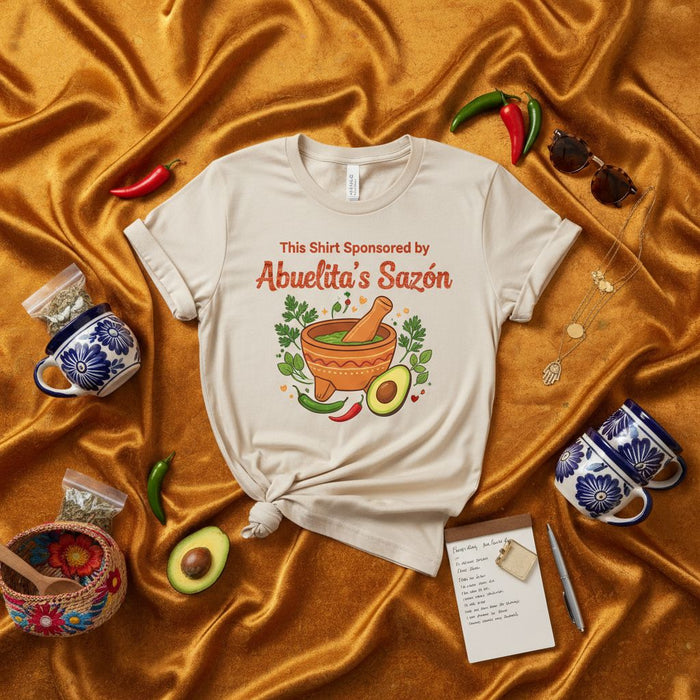 This Shirt Sponsored by Abuelita's Sazón T-Shirt, Funny Mexican Foodie Gift, Spanish Grandma Cooking Tee, Cute Molcajete Avocado Chili Peppers Design, Unisex Fit Mexicada