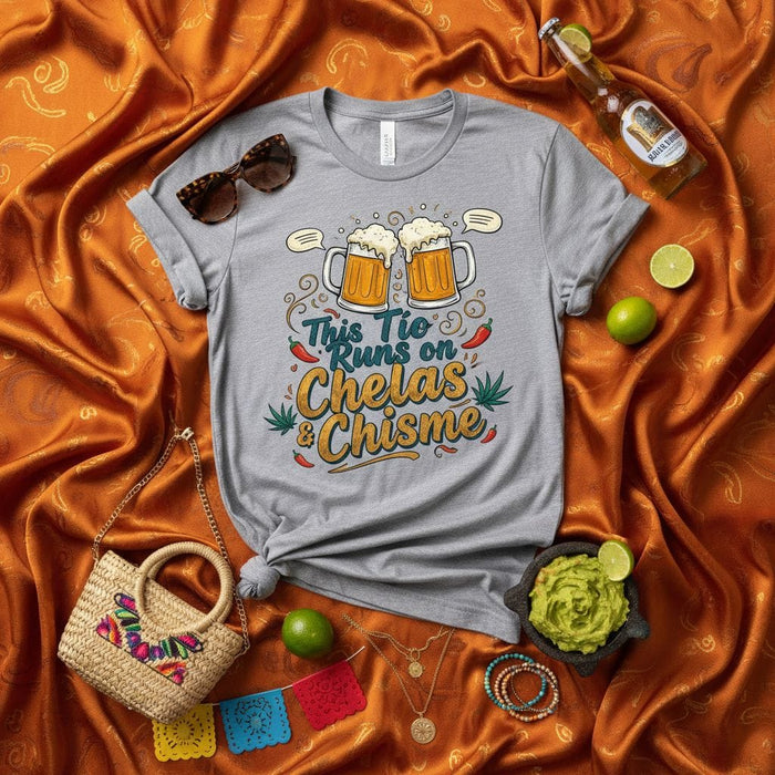 This Tio Runs on Chelas & Chisme T-Shirt, Funny Spanish Beer Uncle Gift Tee, Casual Party Shirt for Him or Her, Hispanic Culture Graphic Top Mexicada
