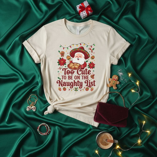 Too Cute To Be On The Naughty List Santa Sombrero Christmas Shirt, Funny Mexican Poinsettia Xmas T-Shirt, Holiday Party Gift Tee, Unisex Graphic Apparel Mexicada