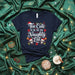 Too Cute To Be On The Naughty List Shirt, Funny Christmas T-Shirt, Holiday Graphic Tee, Festive Skeleton Skull Santa Hat Poinsettia Design, Unisex X-mas Gift Apparel Mexicada